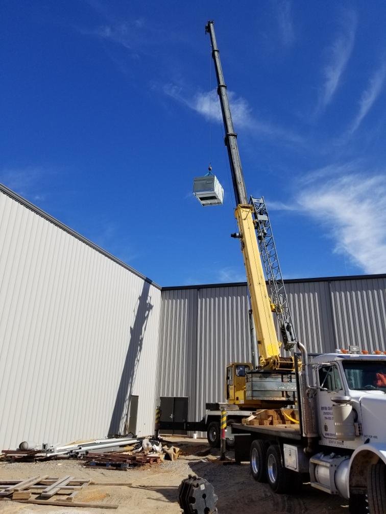 Commercial rooftop crane lift in Charlotte, NC