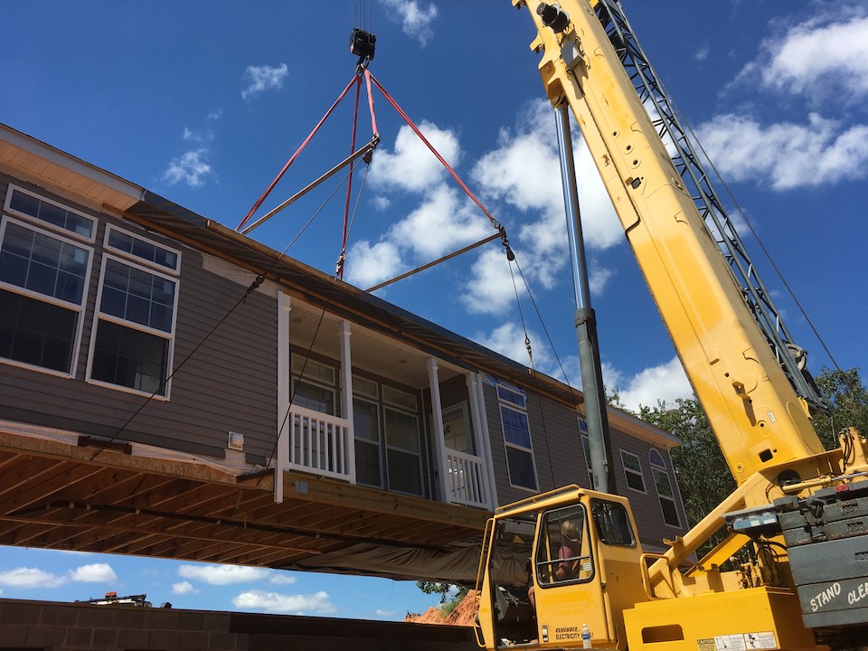 North Carolina crane project with house in the air