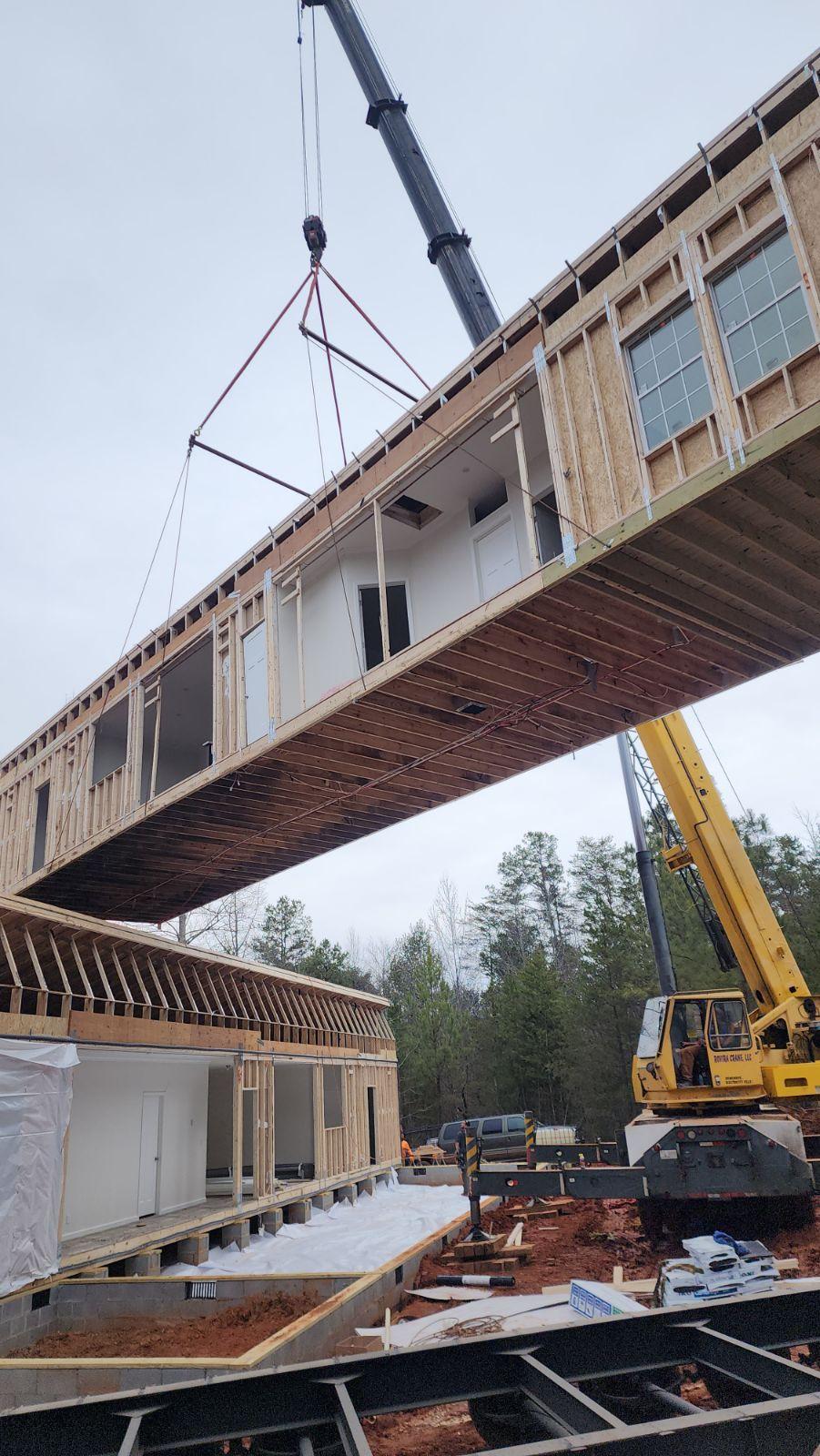 Contact crane service North Carolina for modular home and specialty lifting